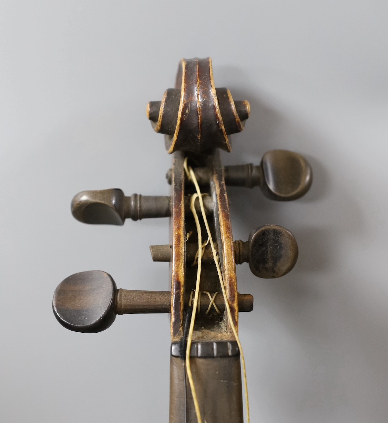 A cased German violin, labelled Stradivarius and dated 1886, back measures 36cm excl button